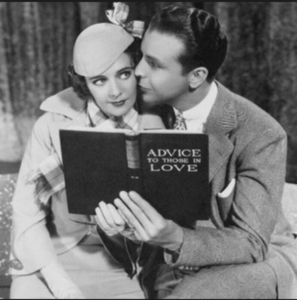 Dick Powell with book