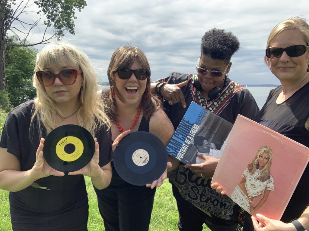 Picture of DJ Kayla Kush, DJ Shotski, Cooper Talbot, Grandma Cyd holding records